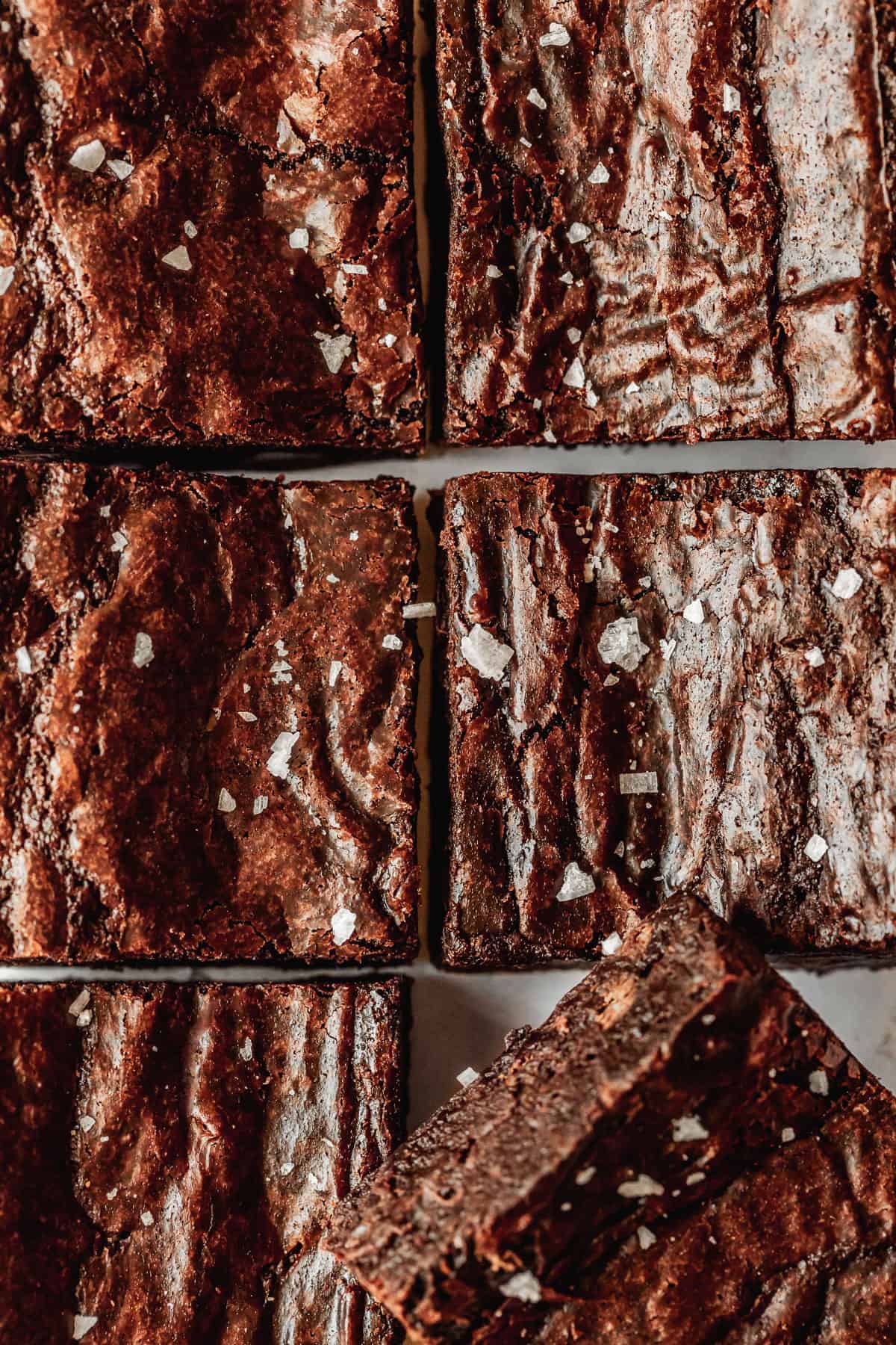 Rows of small-batch brownies with flaky salt.