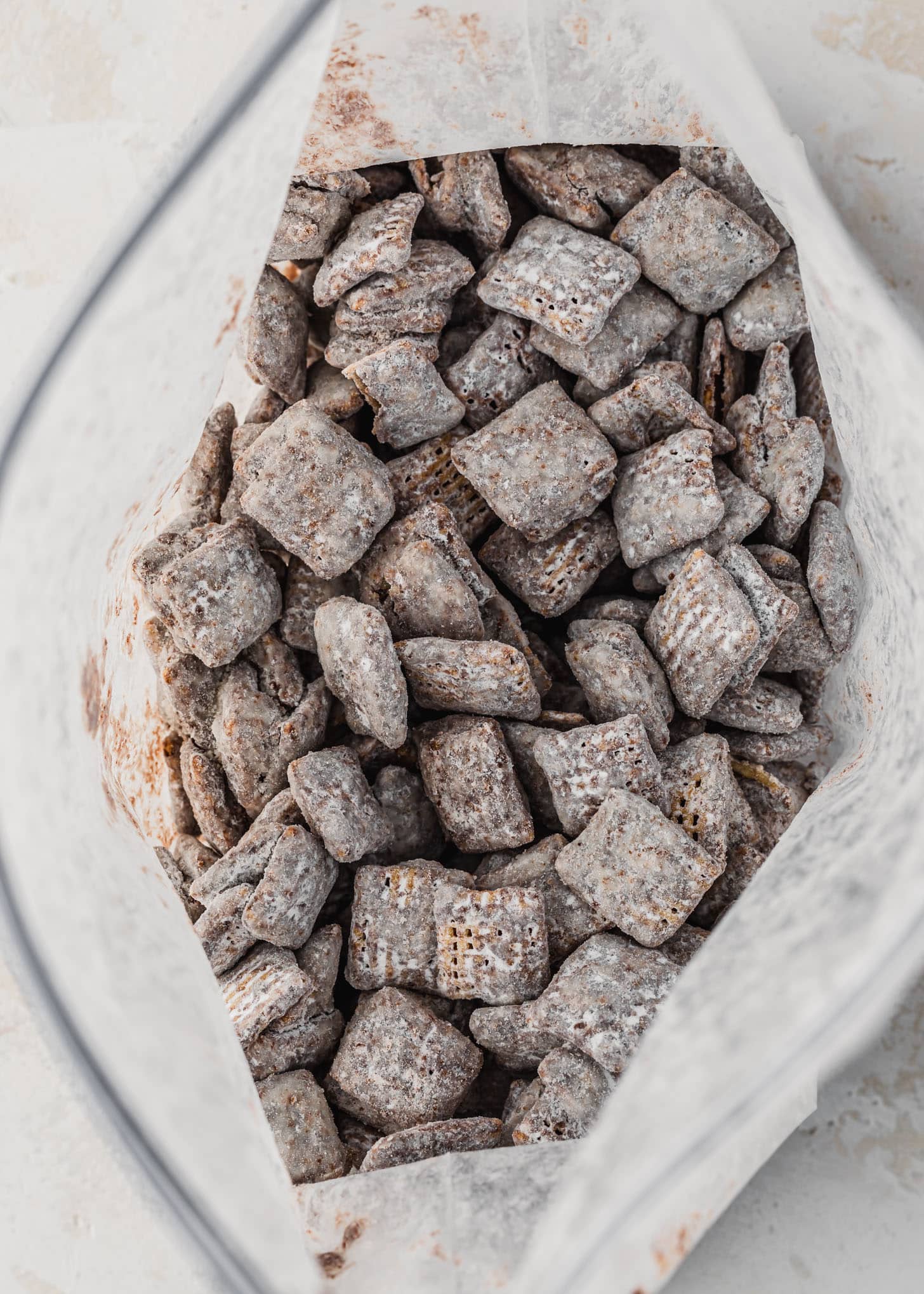 A zipper bag of small batch muddy buddies.