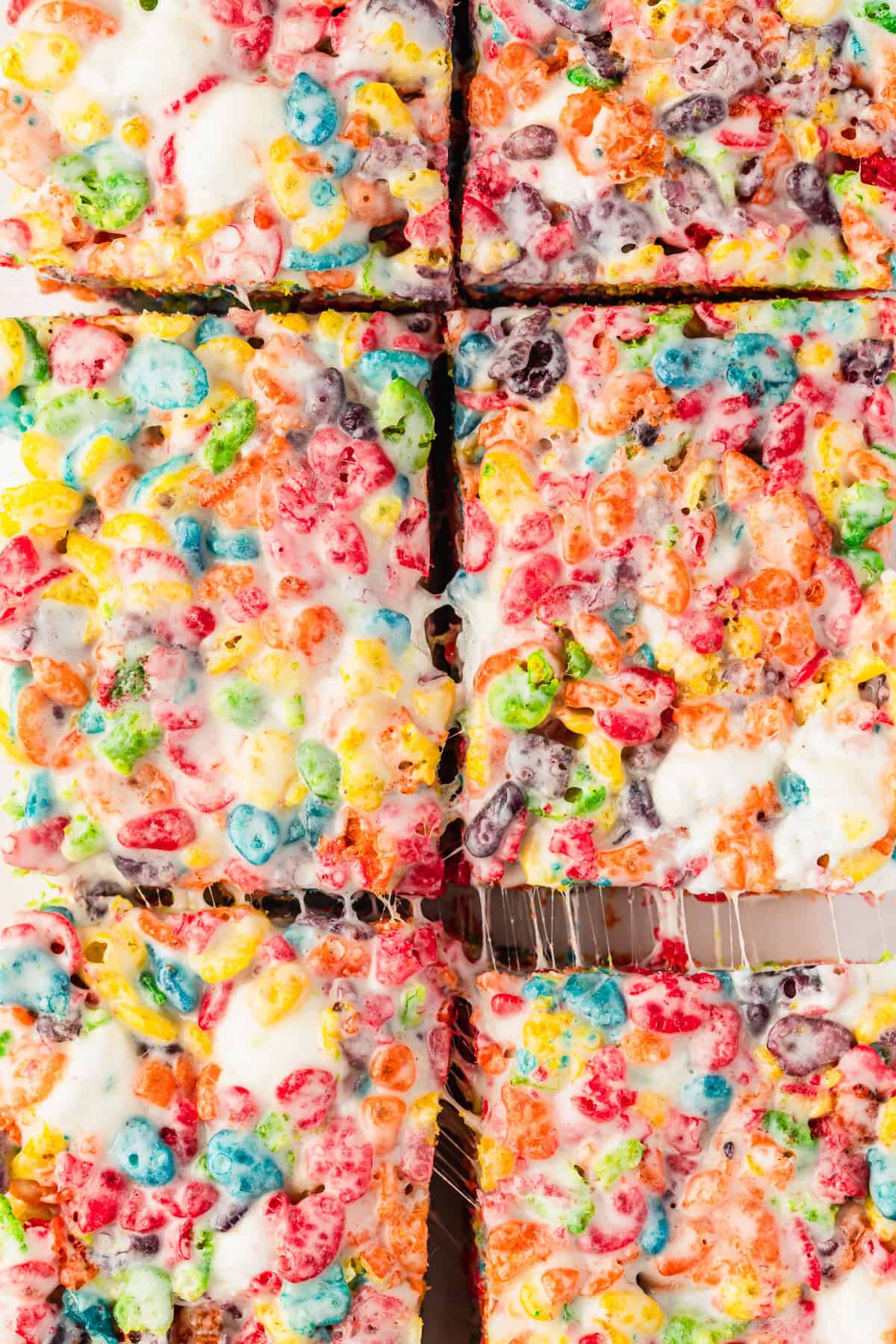 A close up of marshmallow Fruity Pebbles rice krispie treats.