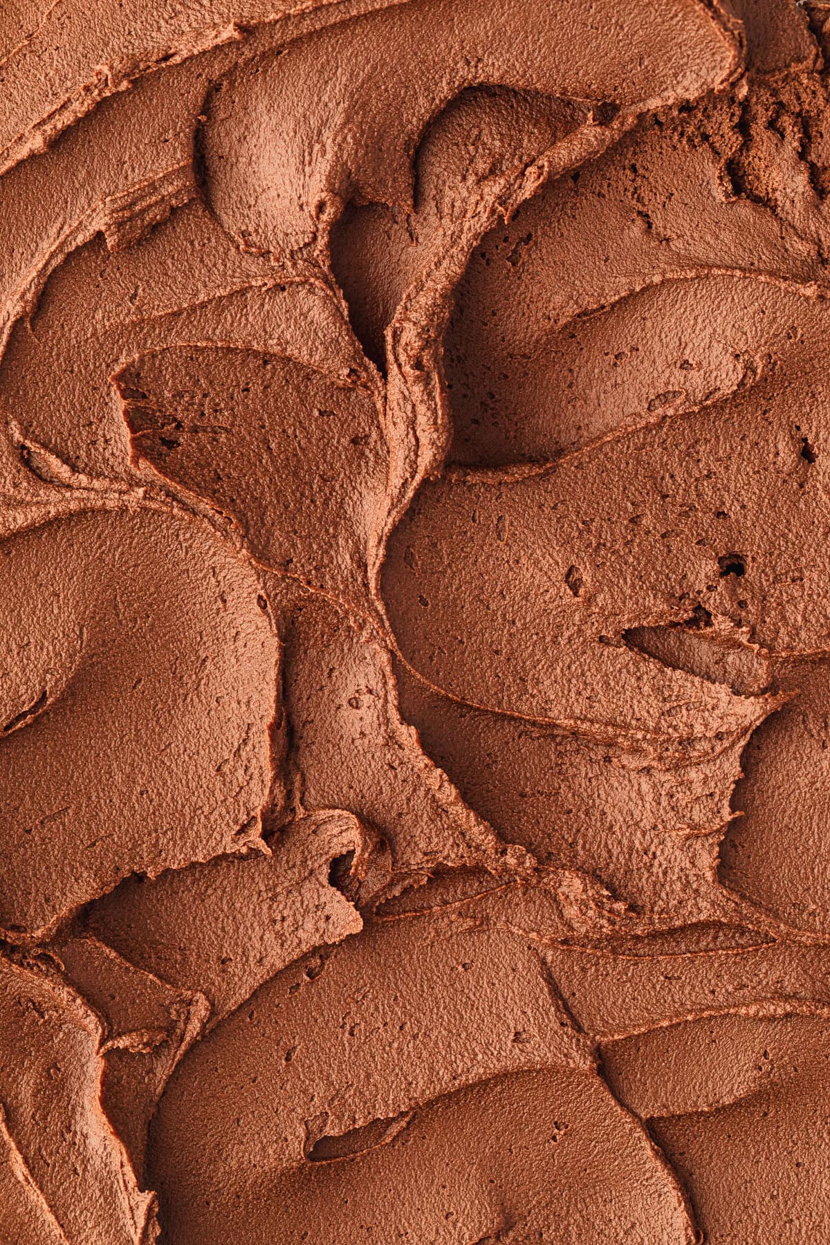 Swirls of small batch whipped chocolate ganache.